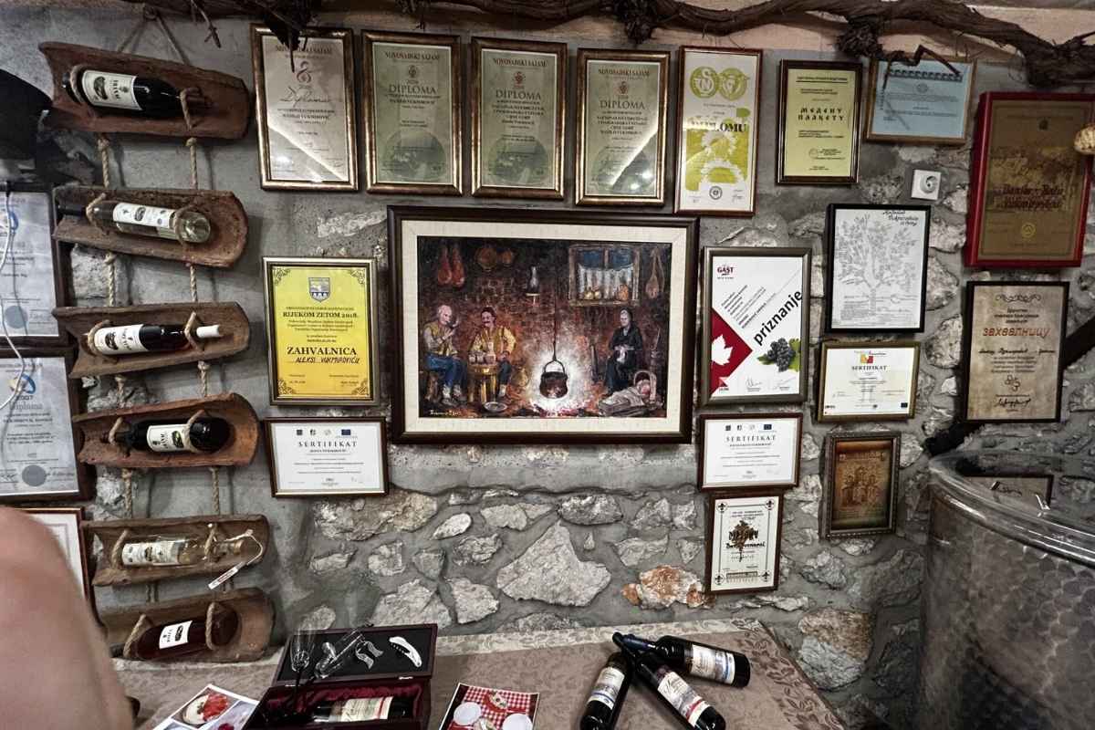 Inside Wine-cellar Cekin at Vukmirović Winery with local wines and delicacies
