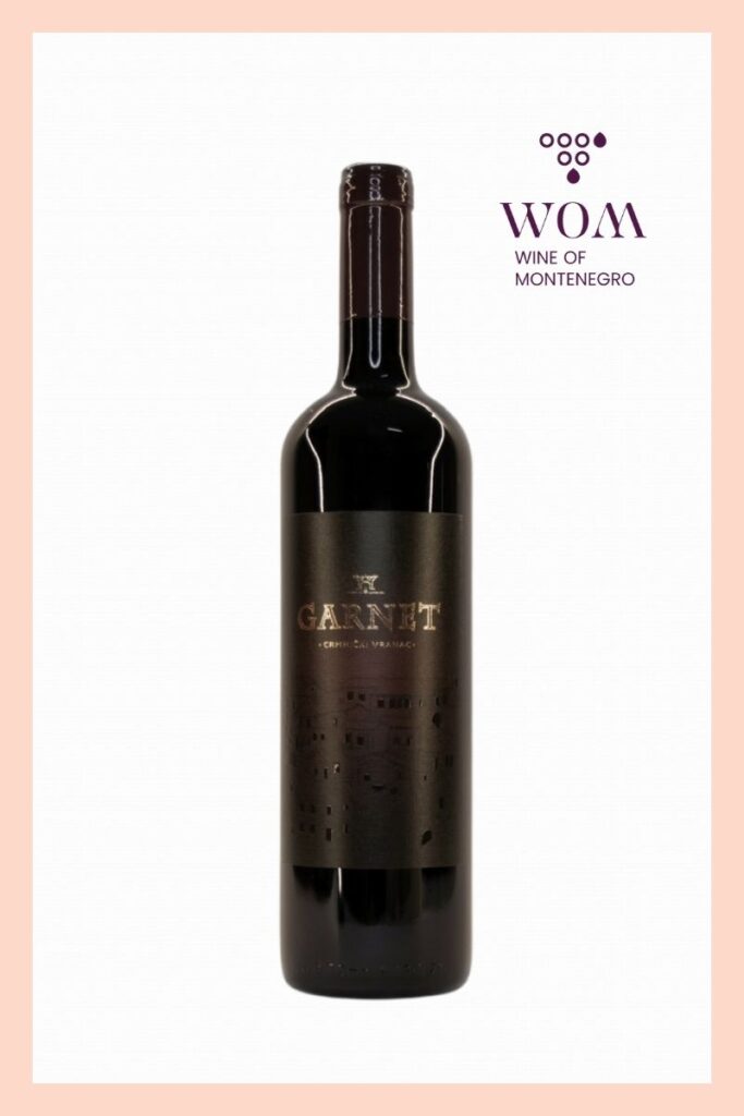 Garnet Vranac 2023 – full-bodied dry red wine with deep red color, produced through spontaneous fermentation and left unfiltered. Distinct aromas of blueberries and mild tannins. Pairs wonderfully with grilled meats, hearty stews, and aged cheeses like cheddar or gouda.