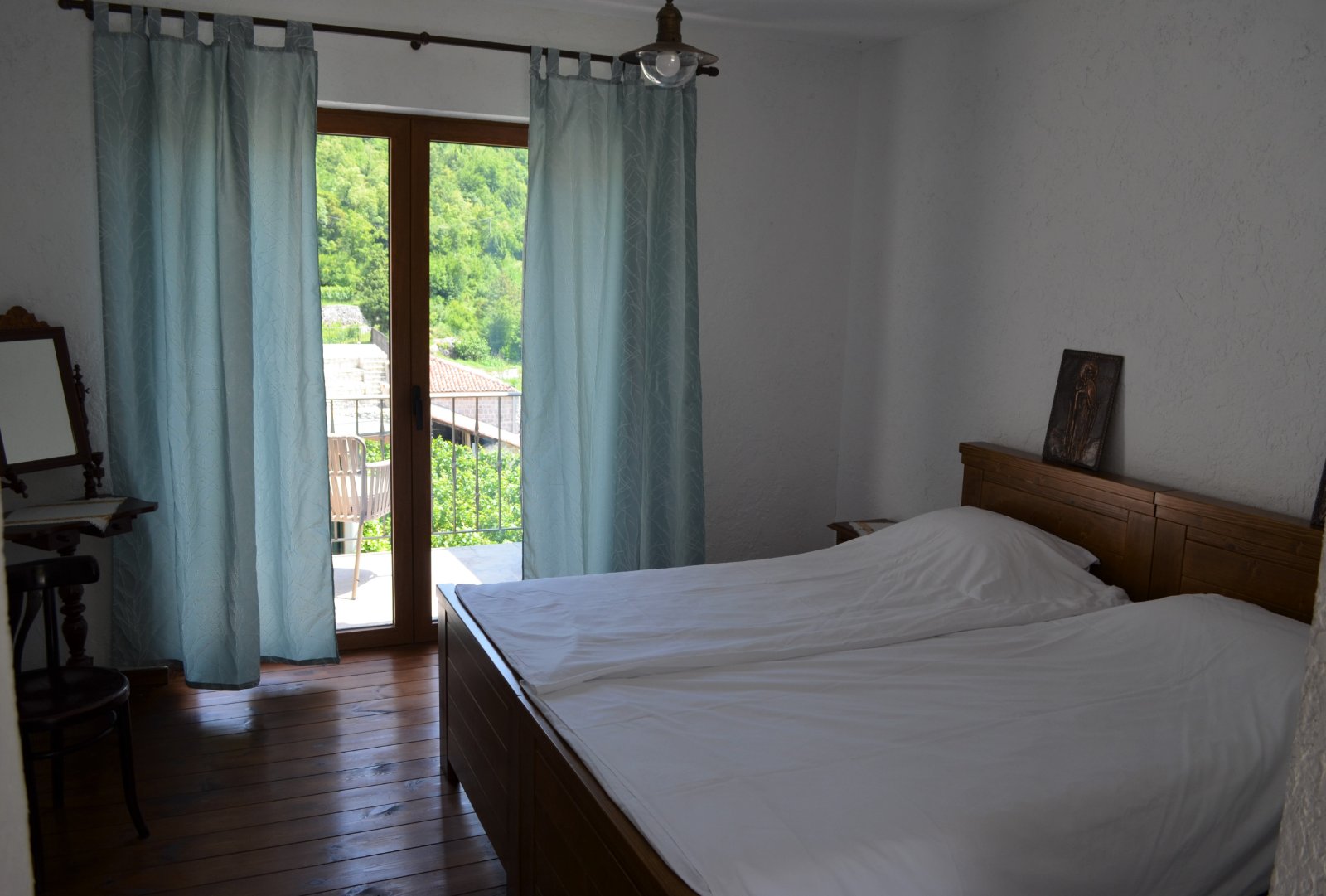 Authentic 20th-century style room at Marković Winery vintage winery accommodation in Montenegro.