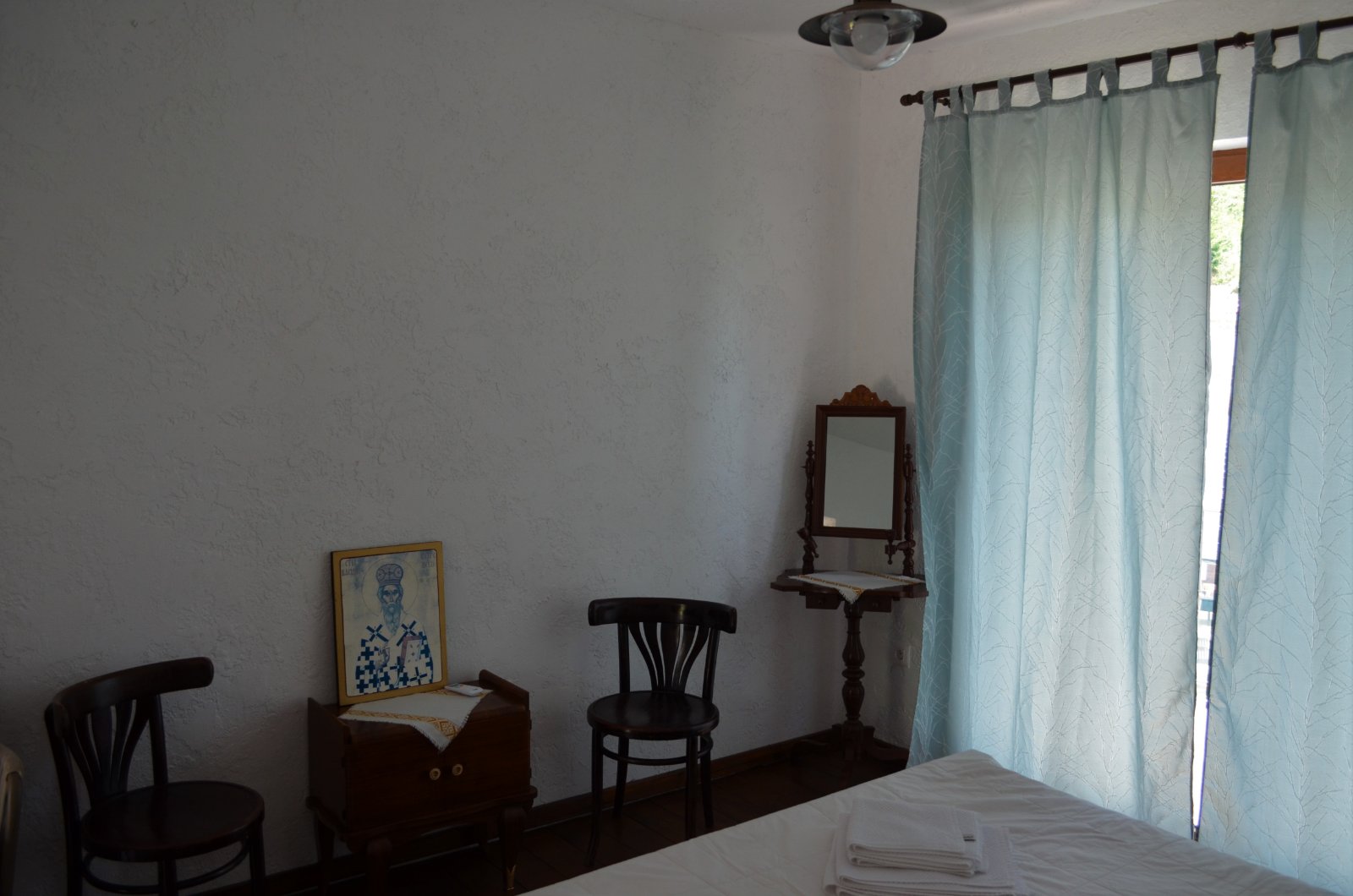 Vintage furniture and decor from 20th-century winery room traditional wine stay in Montenegro.